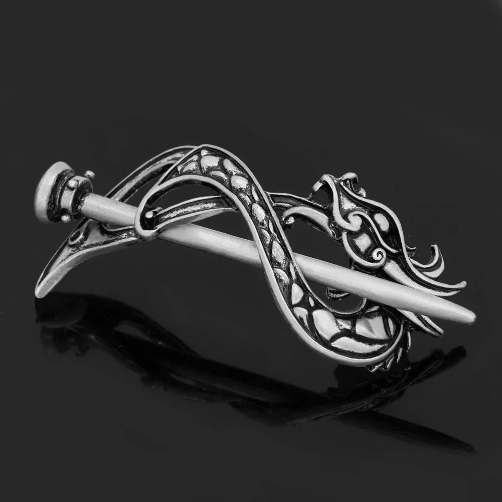 Broche S