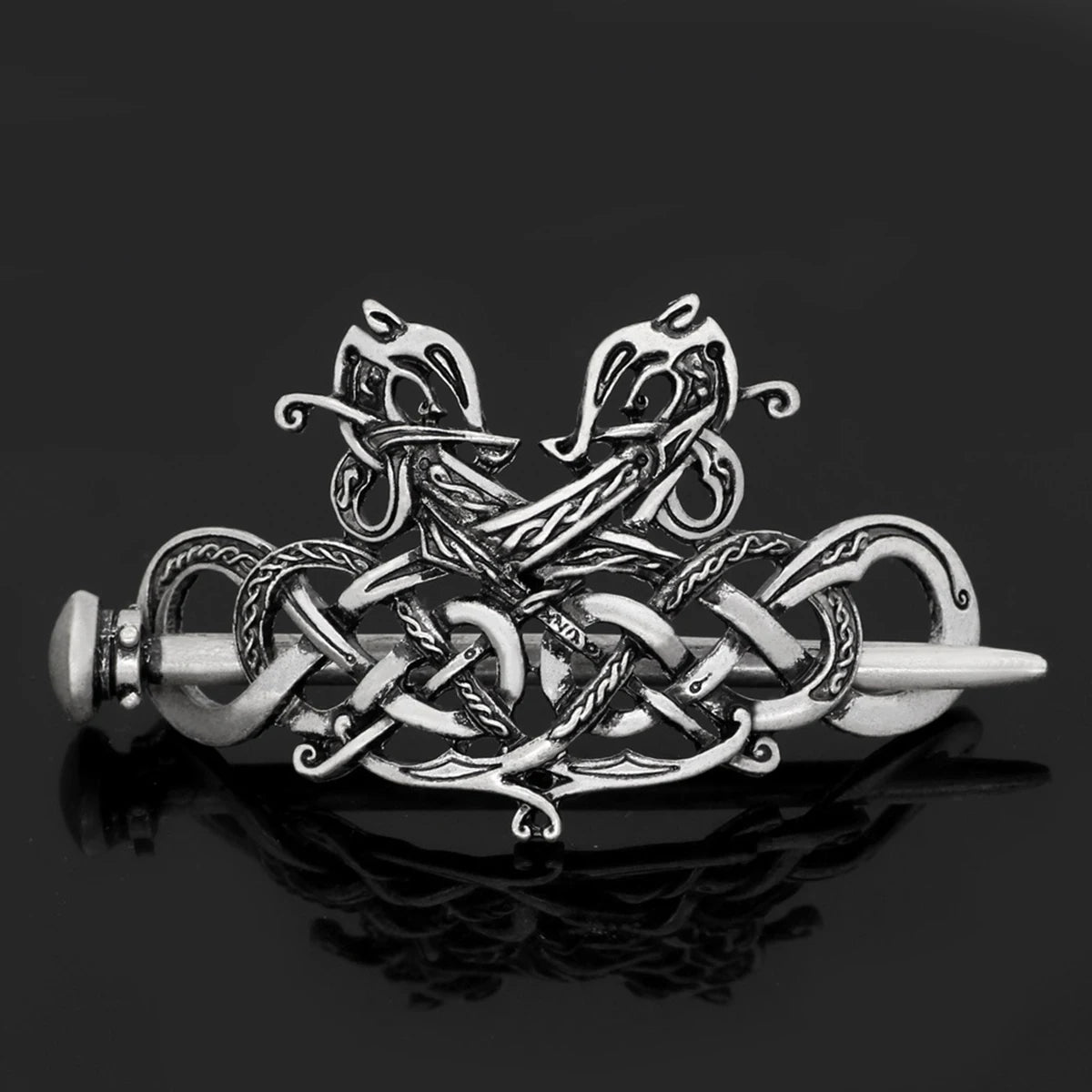 Broche double serpents