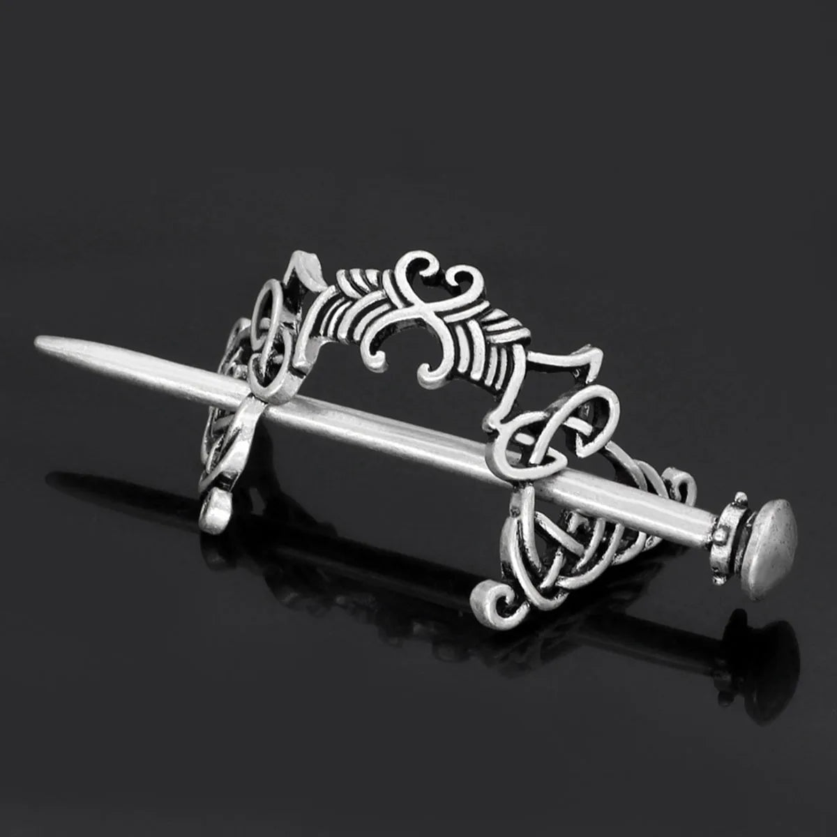 Broche X